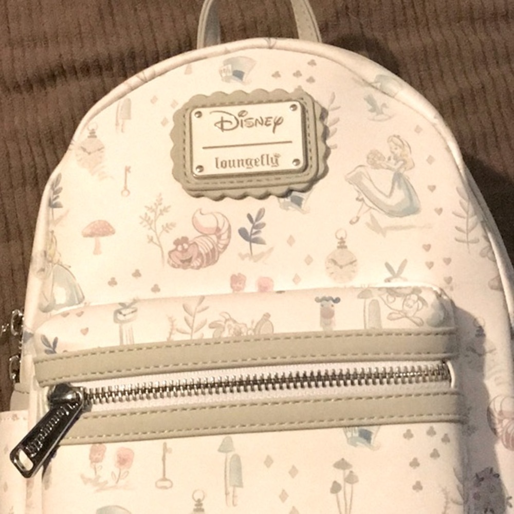 Brand new Alice in wonderland loungefly
